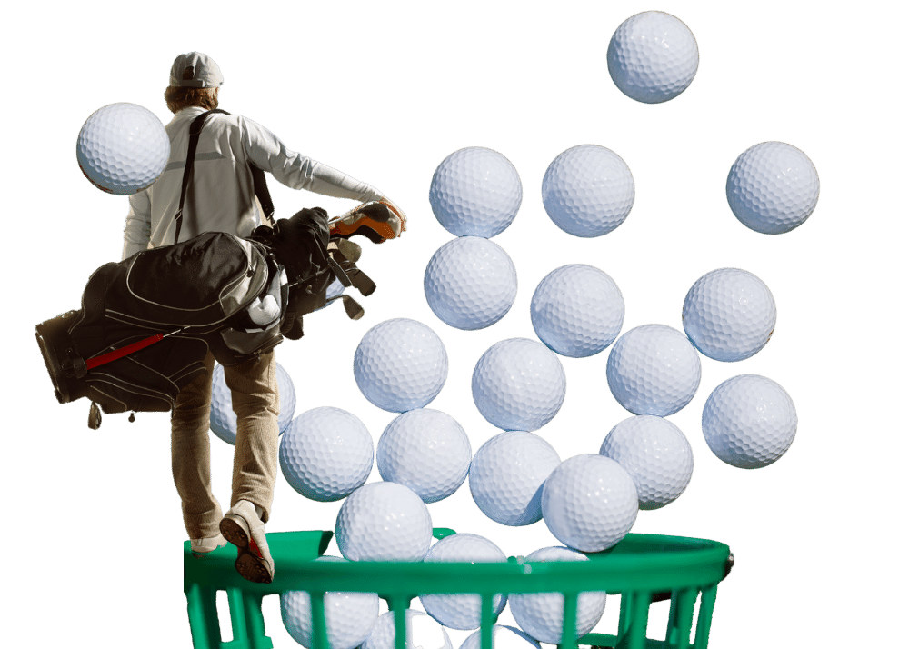 A golfer stands on a basket of golf balls